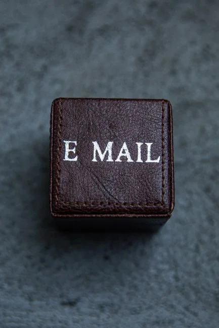 Scrabble tiles arranged to spell SEO Audit on a wooden surface, illustrating digital marketing strategies.